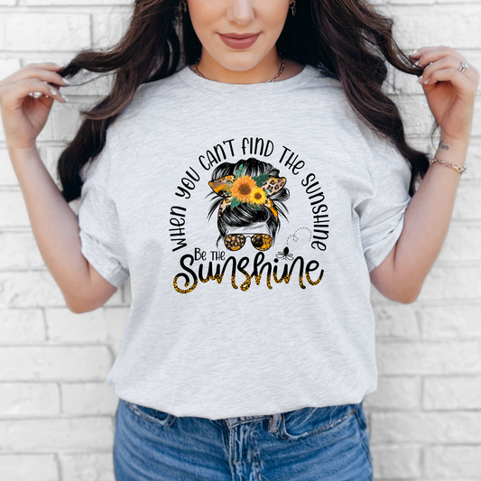 Person wearing a graphic t-shirt with a motivational quote..