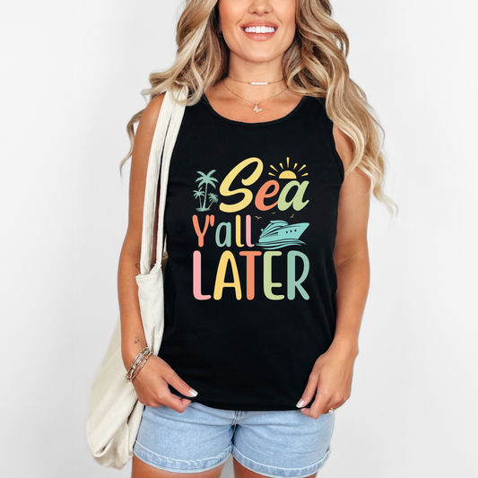 Woman wearing a black tank top with colorful text and graphics.
