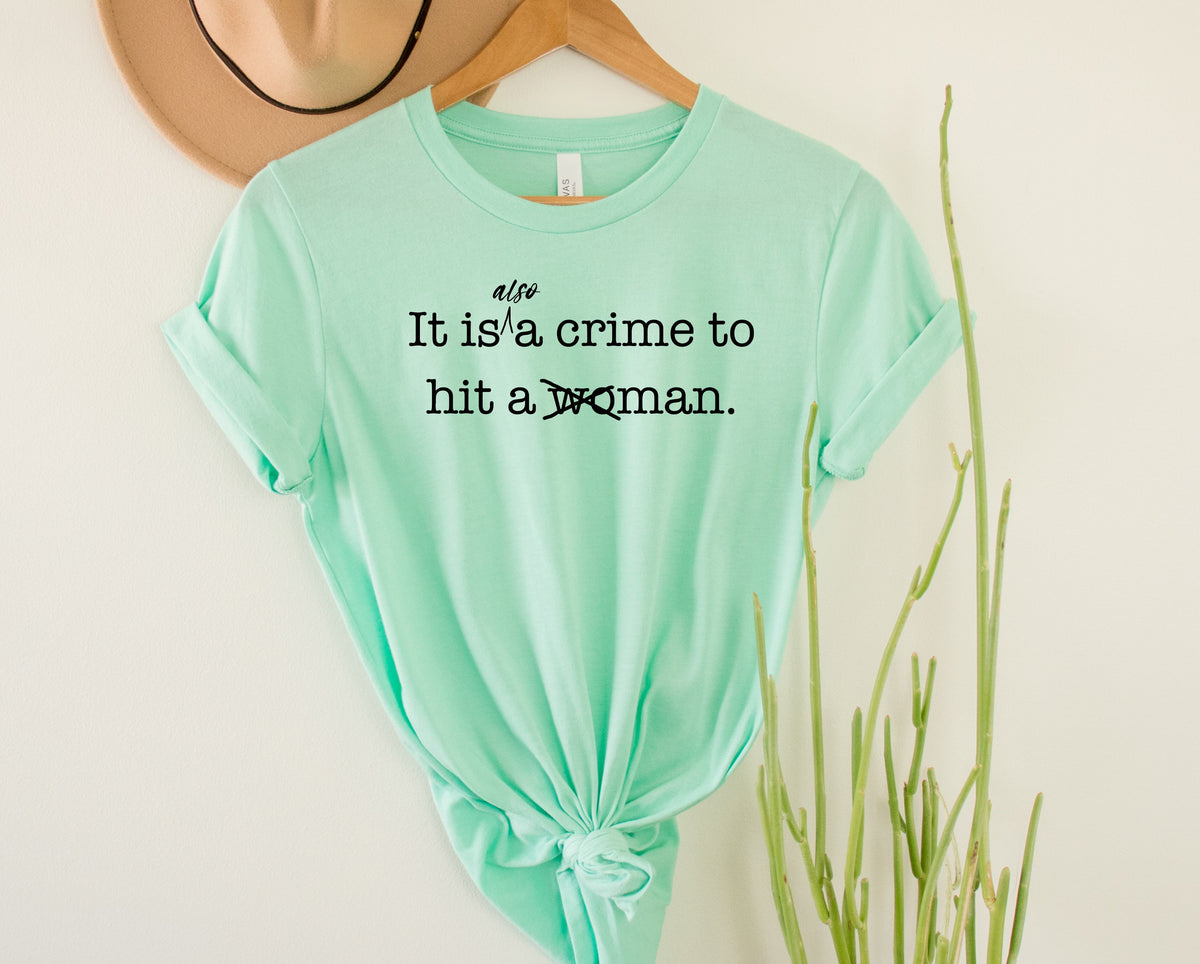 Wholesale It is Also a crime to hit a man Graphic Tee - Heather Sand